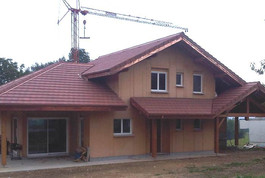 Entreprise construction maison bois : maison individuelle avec terrasse couverte, hautes savoie - Martin charpentes