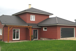 Entreprise de construction bois : maison individuelle en ossature bois & bardage rouge – Meurthe et Moselle – Martin charpentes