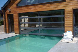 Entreprise construction maison en bois : extension ossature bois, piscine semi-couverte, Marne - Martin charpentes